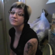 A cute, blonde girl with short hair, tattoos and glasses talks to the camera as she takes a piss and shit while sitting on a toilet. Dirty TP and finished product shown. About 4.5 minutes.
